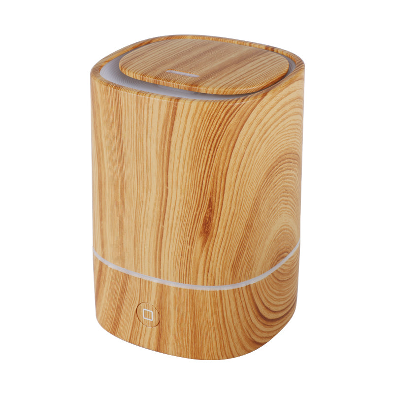 Sand wood grain aroma diffuser angled on a white background